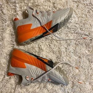 Under Armour Project Rock Women’s Orange HOVR Sneakers